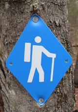 A hiking trail marker.